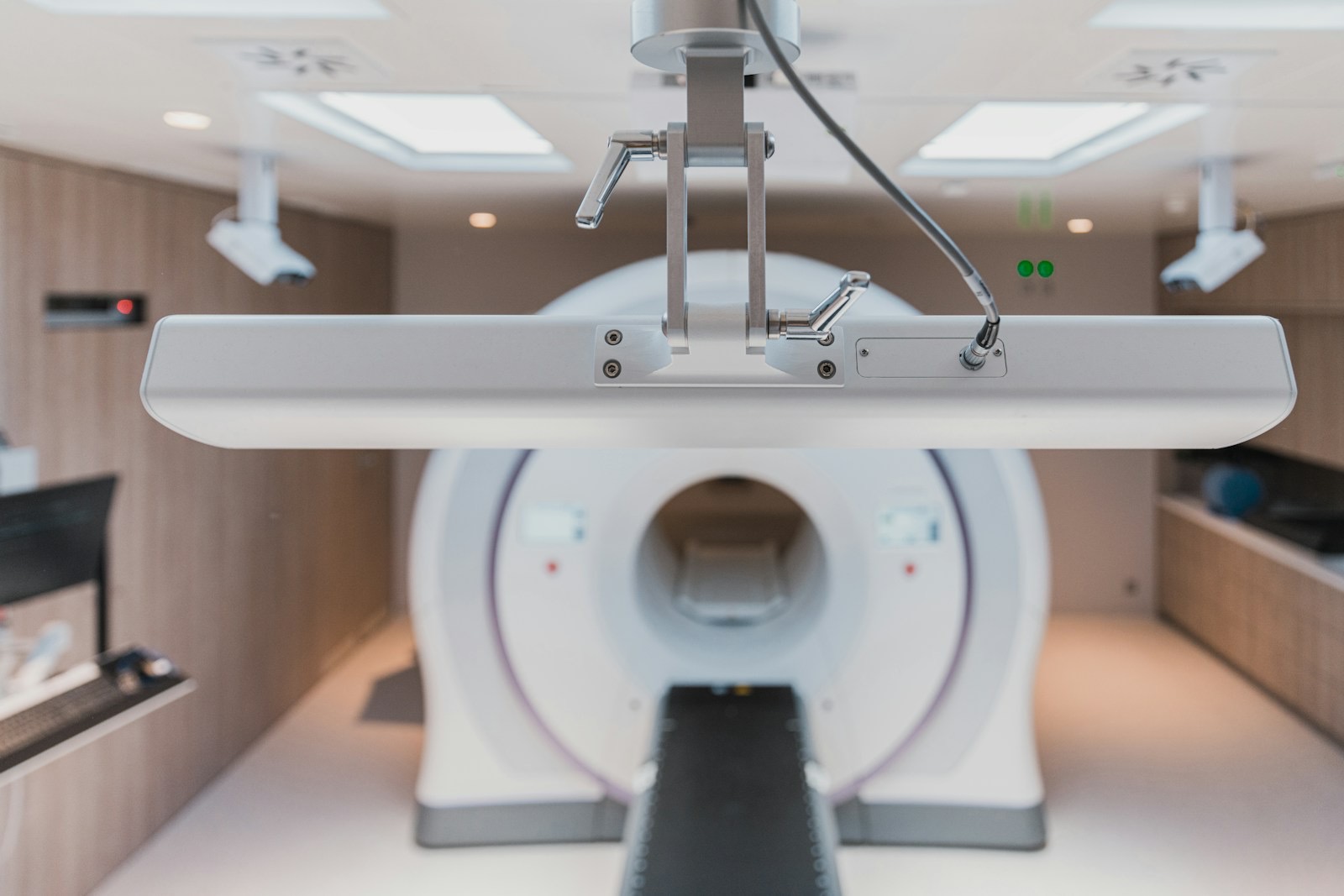 An imaging suite with spine imaging equipment in a modern clinical facility