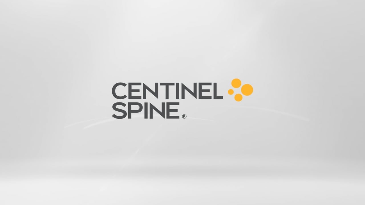 Still frame from the prodisc L surgical animation showing the lumbar implant between two vertebrae